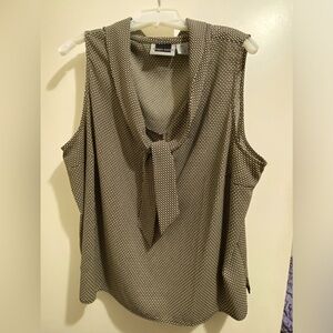 Sleeveless black and gold blouse